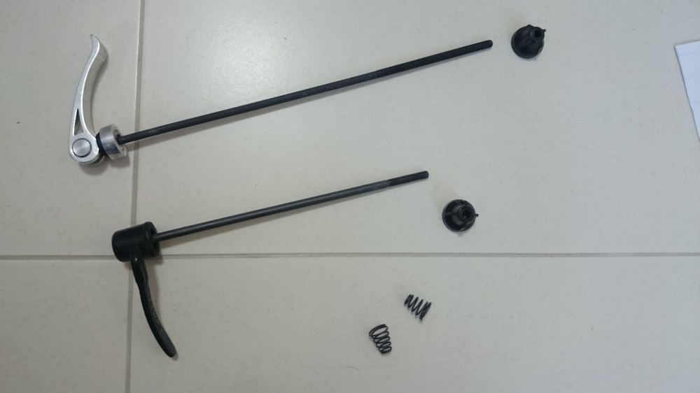 Difference between my original quick-release pin and the one provided by OMM.